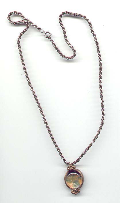 Polymer clay and glass marble necklace.