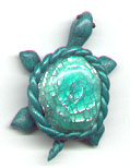 Polymer clay turtle pin.