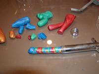 Fill the clay gun